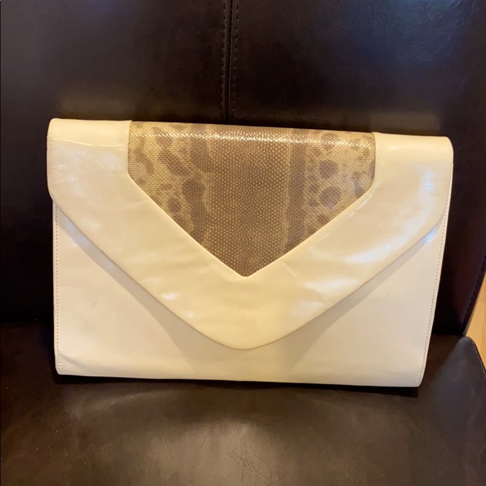 Bruno Magli clutch purse with detachable strap.